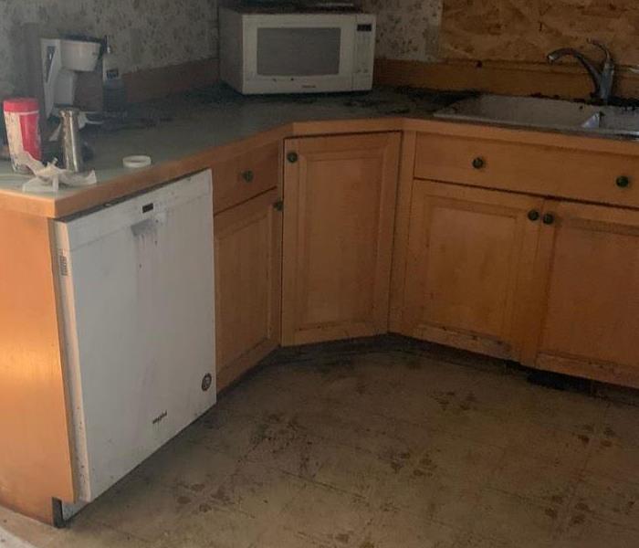 The same kitchen with soot removed.