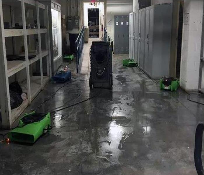 A facility with water damage and SERVPRO drying equipment.