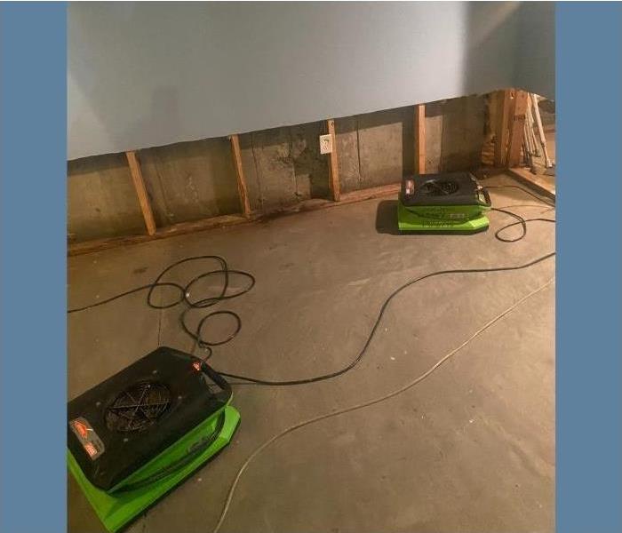 SERVPRO dryers in a Saratoga basement after a storm.
