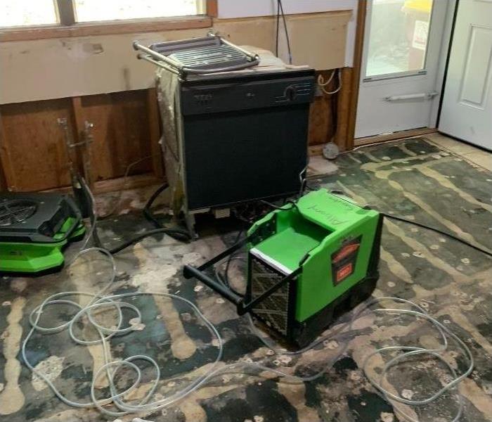 Utilizing our SERVPRO equipment to dry out a Saratoga kitchen after water damage.